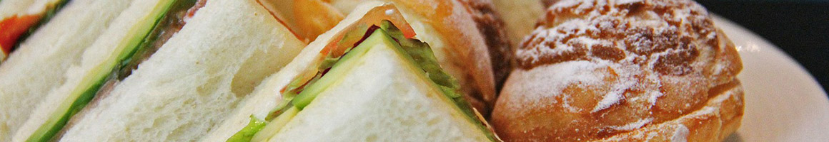 Eating Deli Sandwich at San Francisco Sourdough Eatery restaurant in Liberty Lake, WA.